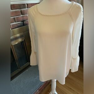 Banana Republic off white blouse with intricate embroidery on sleeves. Size M.